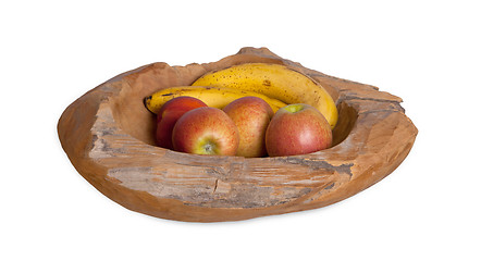 Image showing Ripe fruit assortment in a wooden bowl isolated