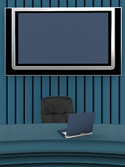 Image showing Office interior with laptop and flat screen