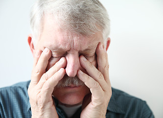 Image showing Senior suffering from sinus pressure