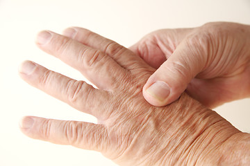 Image showing Aching knuckle on older man