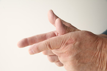 Image showing Man using finger shooting gesture