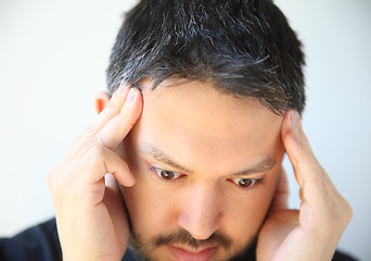 Image showing Temple headache pain in young man