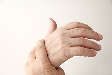Image showing Man has painful hand.