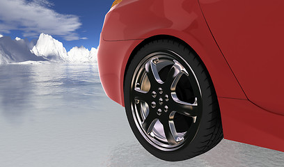 Image showing Red sport car on thin ice , rear wheel