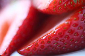 Image showing Freshly sliced strawberries macro