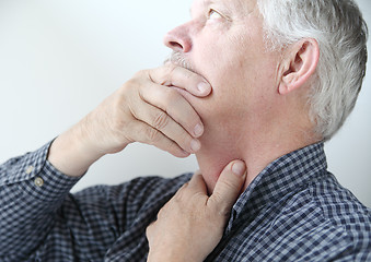 Image showing Man with throat or neck problems