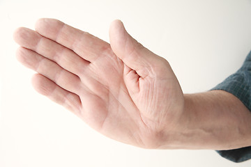 Image showing Man extends his hand.