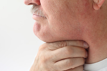 Image showing Older man with throat pain	