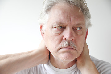 Image showing Mature man with neck pain