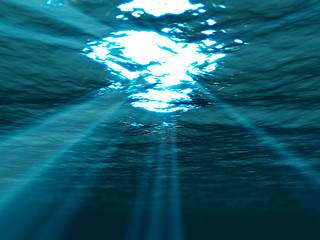 Image showing  Underwater , sea surface with sunbeam shining through