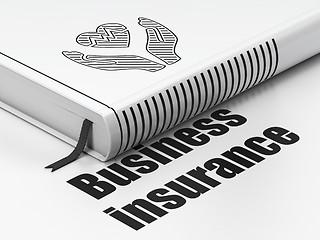 Image showing Insurance concept: book Heart And Palm, Business Insurance on white background