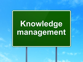 Image showing Learning concept: Knowledge Management on road sign background