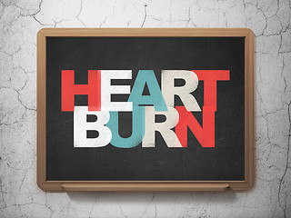 Image showing Medicine concept: Heartburn on School Board background