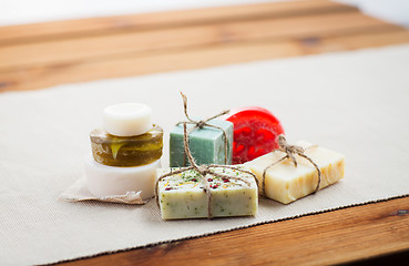 Image showing close up of handmade soap bars on wood