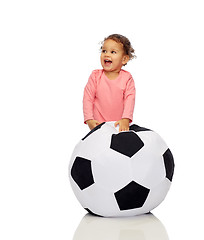 Image showing happy mulatto little baby girl playing with ball