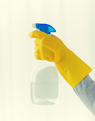 Image showing close up of hand with cleanser spraying