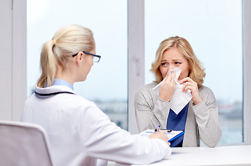 Image showing doctor and ill woman patient with flu at clinic