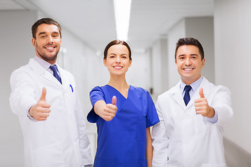 Image showing medics or doctors at hospital showing thumbs up