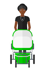 Image showing Woman pushing pram.