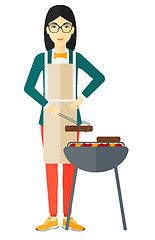 Image showing Woman preparing barbecue.