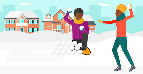 Image showing Couple playing in snowballs.