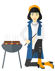 Image showing Woman preparing barbecue.