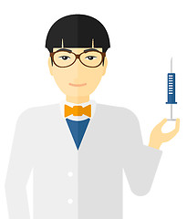 Image showing Doctor holding syringe.