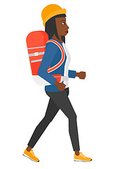 Image showing Woman with backpack hiking.