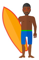 Image showing Surfer holding surfboard.