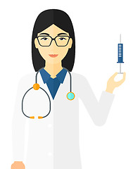 Image showing Doctor holding syringe.