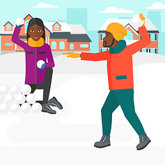 Image showing Couple playing in snowballs.