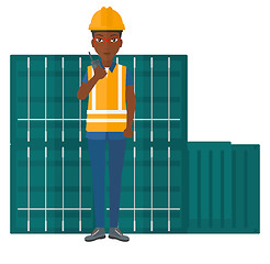 Image showing Stevedore standing on cargo containers background.