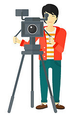 Image showing Cameraman with movie camera.
