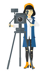 Image showing Camerawoman with movie camera.