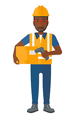 Image showing Worker checking barcode on box.