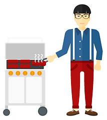Image showing Man preparing barbecue.