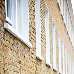 Image showing old window in europe london  red brick wall and      historical 