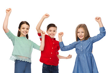 Image showing happy boy and girls celebrating victory