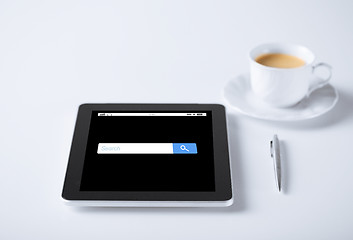 Image showing tablet pc with internet browser search and coffee