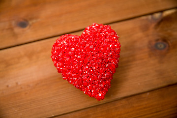 Image showing close up of red heart decoration on wood