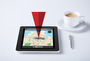 Image showing tablet pc with gps navigator map and cup of coffee