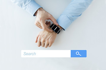 Image showing hands with internet browser search on smartwatch