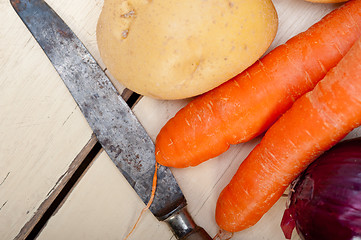 Image showing basic vegetable ingredients carrot potato onion 