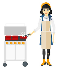 Image showing Woman preparing barbecue.