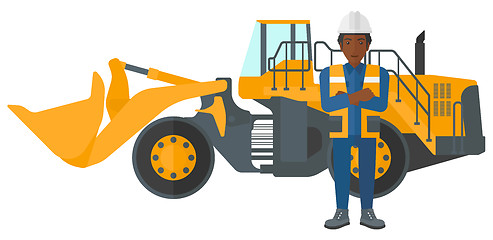 Image showing Miner with mining equipment on background.