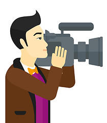 Image showing Cameraman with video camera.