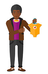 Image showing Man holding clothes for baby.