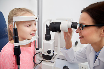 Image showing optician with tonometer and patient at eye clinic