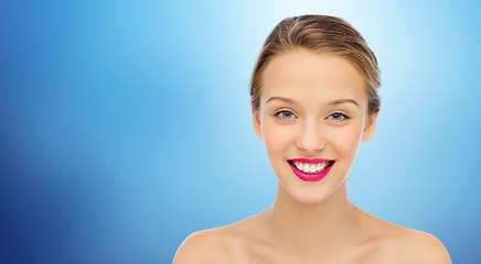 Image showing smiling young woman face and shoulders