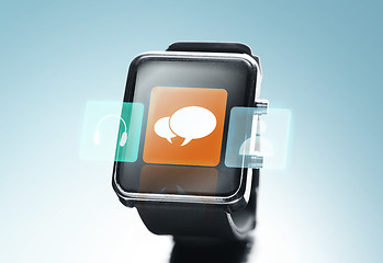 Image showing close up of black smart watch with messenger icon